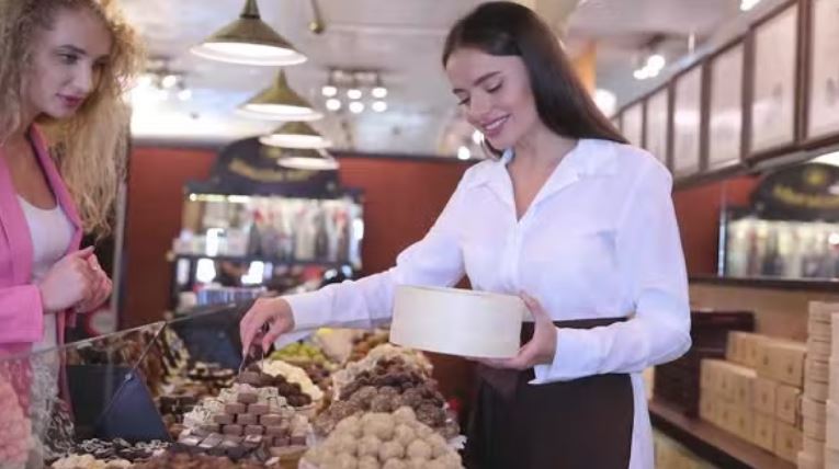 woman buying chocolates on wholesale chocolate program