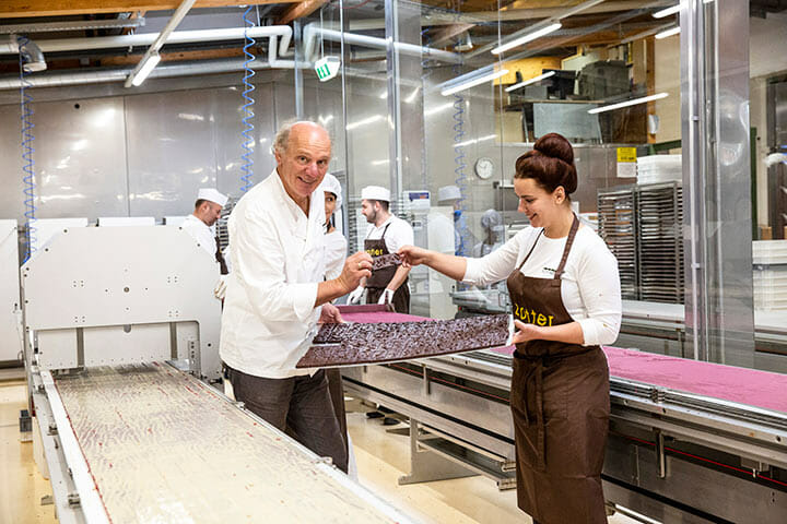 Josef and Julia Zotter making Hand-Scooped Chocolates